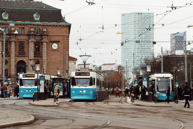 Trams at a busy intersection in Gothenburg city center, Sweden.